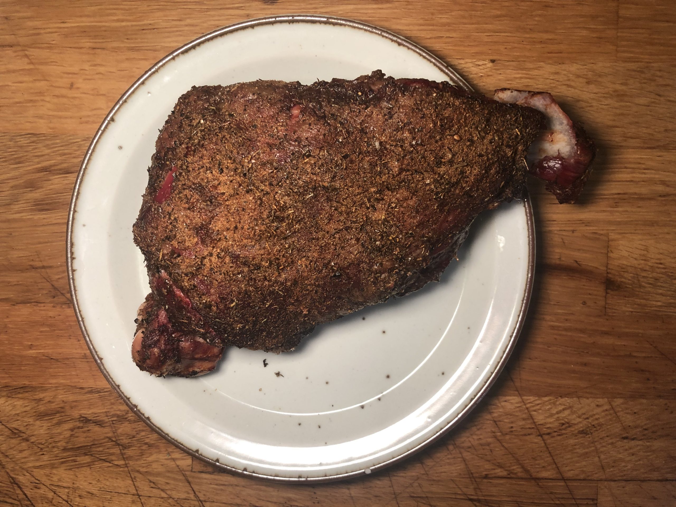 Smoke whole lamb leg